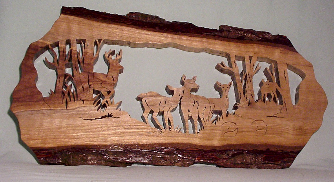 A deer herd - made from select black walnut by Jeff Muffie