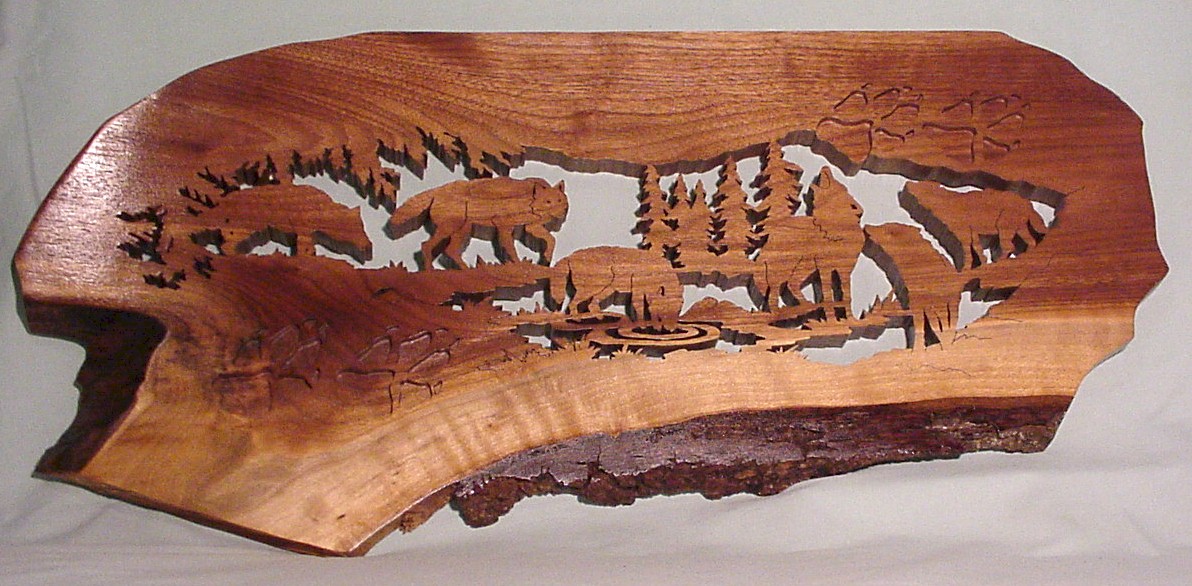 A wolf pack - made from select black walnut by Jeff Muffie